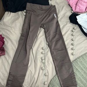 Grayish purple Gymshark leggings with cute little holes up both legs